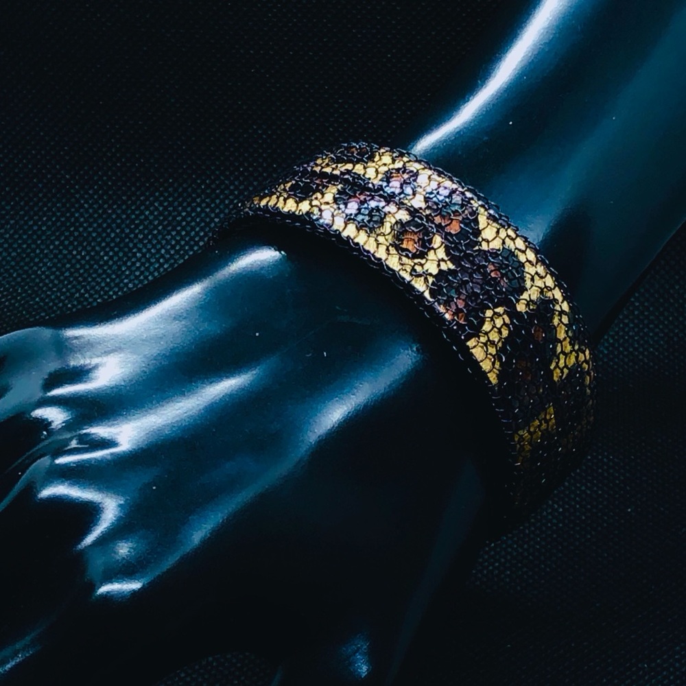 Handmade caged crocheted leopard cuff bracelet.